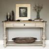 solid oak console table with a drawer to front and bottom shelf finished in a heavily distressed grey with a contrasting waxed oak top