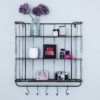 industrial style black metal three shelf wall unit with five hanging hooks