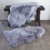 deep pile light grey new zealand sheepskin rug shown in single or double