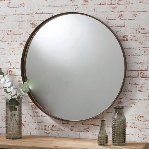 round metal industrial style wall mirror in bronze finish