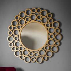 round gold wall mirror with small circular bubble frame
