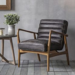 retro style leather armchair upholstered in a weathered black leather within an ash wooden frame