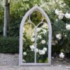 large chapel garden mirror with a stone metal frame available in two large sizes