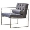 angular chrome frame occasional chair upholstered in grey velvet with an all over button back design complete with bolster cushion