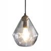 a prism shaped glass pendant light with a brass bulb fitting and black cord