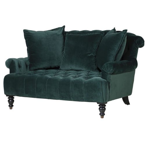 two-seater deep green velvet sofa with a button back design and three oversized scatter cushions