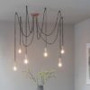 industrial pendant light consisting of six hanging bulb holders on black cord - available in copper, chrome or black