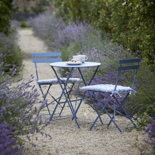 blue outdoor metal bistro set comprising of small table and two foldable chairs