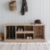 rustic wooden shoe locker made from spruce with two welly compartments and four shoe compartments