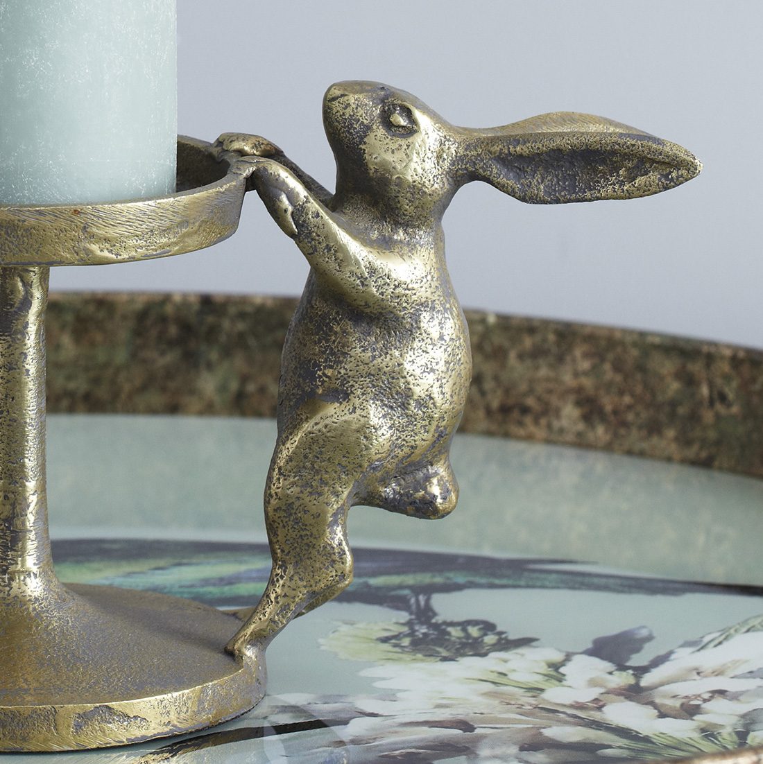 Brass Bunny Candle Holder. brass pillar candle holder with a climbing bun.....
