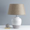 large dip glazed white stone table lamp with tapered natural hessian tapered lampshade