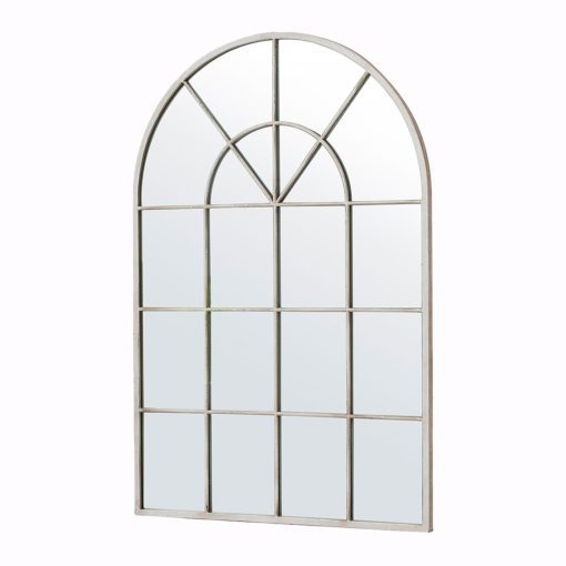 cream metal framed arched window mirror with a lightly distressed finish