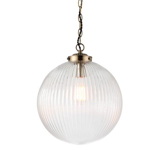 clear glass globe pendant light with a ribbed detailing suspended from an antique gold adjustable chain