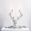 statement weighty polished silver metal stag's head six candle candleabra