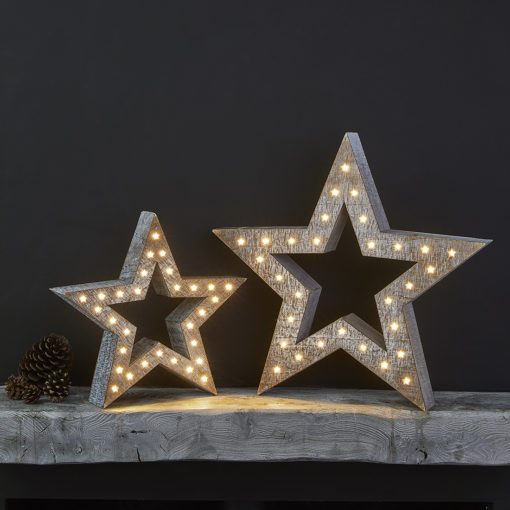 rustic natural wooden three dimensional star lights avaialble in two sized with tiny star shaped warm white led lights set in front