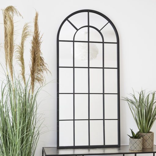 large black metal framed arched industrial window mirror