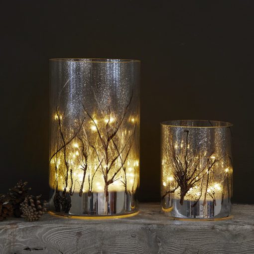 frosted glass lanterns available in two sizes with a woodland design incorporating warm-white LED lights