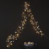 fairy light garland decoratived with gold and silver shiny sequin discs and warm-white lights