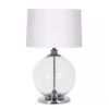 large glass ball table lamp with a round silver iron base, collar and inner stem completed with a 17* white linen drum lampshade