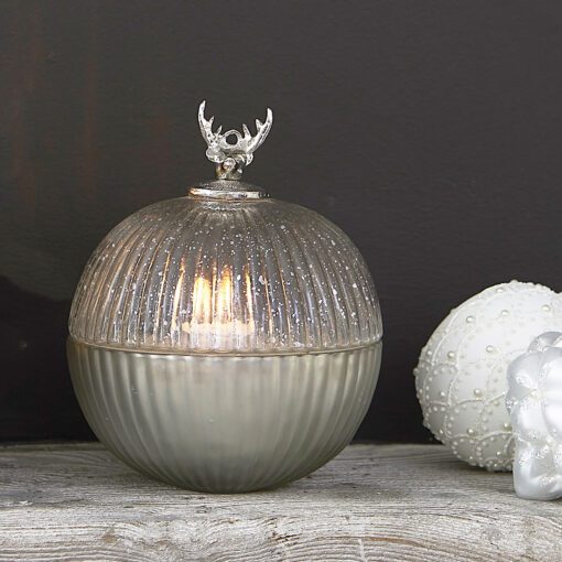scented glass ribbed bauble candle pot with a silver mercury finish and reindeer head topper