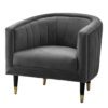 dark grey velvet tub chair with wide pleats and gold tipped legs