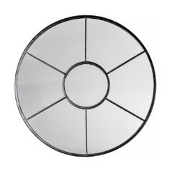 round wall mirror with a black metal window frame