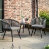 set of two outdoor tub chairs with a waterproof rope weave and powder coated aluminium frame with charcoal cushion and matching side table