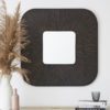 large square wooden wall mirror with a deep dark frame with a pleated design