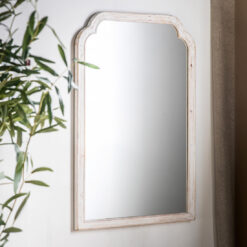 vintage style wooden wall mirror with a curved top and distressed white painted finish