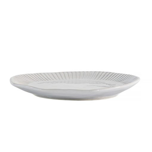 set of four off-white porcelain side plates with an uneven rustic shape and ribbed edging