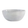 set of four off-white porcelain bowls with an uneven rustic shape and ribbed edging