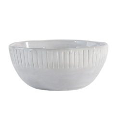 set of four vintage white porcelain bowls with an uneven rustic shape and ribbed edging