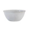 set of four off-white porcelain bowls with an uneven rustic shape and beaded edging