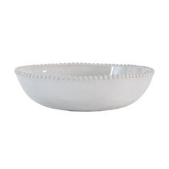 set of four white porcelain pasta bowls with an uneven rustic shape and beaded edging