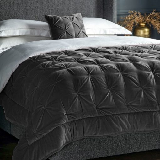 cotton velvet quilted pin-tucked bedspread in deep grey wth a natural cotton linen mix reverse