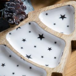 christmas tree shaped nibbles dish crafted from mango wood with a white glaze and star design