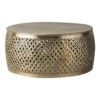 drum shaped round metal coffee table with a fretwork surround and hammered top finished in a lightly distressed pale gold