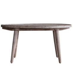 round natural wooden coffee table with an ornately carved top and white-wash finish