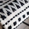 black and cream patterned cream throw with tassels