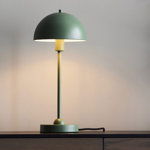 small contemporary sage green metal table lamp with a stick base and domed shade