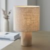 small table lamp with a natural wooden base and linen lampshade