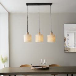 scandinavian inspired linear three pendant light