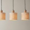 scandinavian inspired linear three pendant light