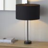 cylinder shaped glass table lamp with black metal fittings complete with black drum lampshade
