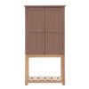 tall two-door storage cupboard sat on an open oak frame with slatted shelf with panelled doors painted in a deep blush pink