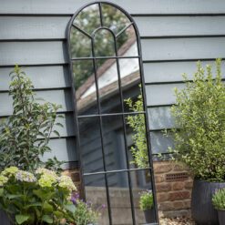 tall slim black metal arched window outdoor garden mirror