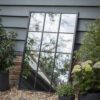 rectangular black metal framed window garden mirror with twelve panes