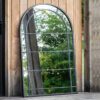 contemporary large arched window outdoor garden mirror