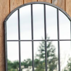 large black metal framed window pane garden mirror with curved top