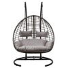 double hanging cocoon chair with a natural rattan look and deep showerproof cushions